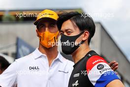 (L to R): Daniel Ricciardo (AUS) McLaren with Guanyu Zhou (CHN) Alpine F1 Team Test Driver. 01.07.2021. Formula 1 World Championship, Rd 9, Austrian Grand Prix, Spielberg, Austria, Preparation Day.