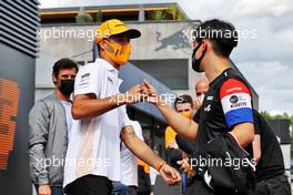 (L to R): Daniel Ricciardo (AUS) McLaren with Guanyu Zhou (CHN) Alpine F1 Team Test Driver. 01.07.2021. Formula 1 World Championship, Rd 9, Austrian Grand Prix, Spielberg, Austria, Preparation Day.