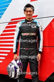 Guanyu Zhou (CHN) Alpine F1 Team Test Driver - with his helmet. 01.07.2021. Formula 1 World Championship, Rd 9, Austrian Grand Prix, Spielberg, Austria, Preparation Day.