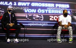 (L to R): Esteban Ocon (FRA) Alpine F1 Team and Lewis Hamilton (GBR) Mercedes AMG F1 in the FIA Press Conference. 01.07.2021. Formula 1 World Championship, Rd 9, Austrian Grand Prix, Spielberg, Austria, Preparation Day.