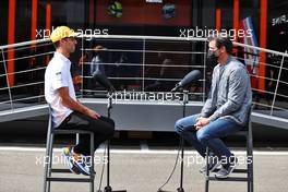 (L to R): Daniel Ricciardo (AUS) McLaren with Mark Webber (AUS) Channel 4 Presenter. 01.07.2021. Formula 1 World Championship, Rd 9, Austrian Grand Prix, Spielberg, Austria, Preparation Day.
