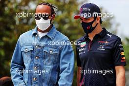 (L to R): Lewis Hamilton (GBR) Mercedes AMG F1 with Sergio Perez (MEX) Red Bull Racing. 04.06.2021. Formula 1 World Championship, Rd 6, Azerbaijan Grand Prix, Baku Street Circuit, Azerbaijan, Practice Day.