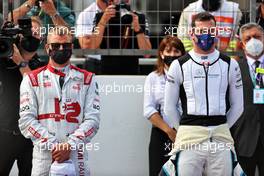 (L to R): Kimi Raikkonen (FIN) Alfa Romeo Racing and Nicholas Latifi (CDN) Williams Racing on the grid. 06.06.2021. Formula 1 World Championship, Rd 6, Azerbaijan Grand Prix, Baku Street Circuit, Azerbaijan, Race Day.