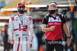 Kimi Raikkonen (FIN) Alfa Romeo Racing with Mark Arnall (GBR) Personal Trainer on the grid. 06.06.2021. Formula 1 World Championship, Rd 6, Azerbaijan Grand Prix, Baku Street Circuit, Azerbaijan, Race Day.