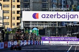 Race winner Sergio Perez (MEX) Red Bull Racing RB16B takes the chequered flag at the end of the race. 06.06.2021. Formula 1 World Championship, Rd 6, Azerbaijan Grand Prix, Baku Street Circuit, Azerbaijan, Race Day.