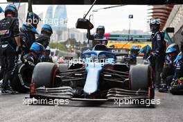 Fernando Alonso (ESP) Alpine F1 Team A521 makes a pit stop. 06.06.2021. Formula 1 World Championship, Rd 6, Azerbaijan Grand Prix, Baku Street Circuit, Azerbaijan, Race Day.