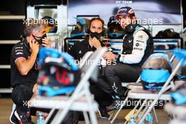 Fernando Alonso (ESP) Alpine F1 Team with Edoardo Bendinelli (ITA) Alpine F1 Team Personal Trainer (Left) and Karel Loos (BEL) Alpine F1 Team Race Engineer (Centre) in the pits while the race is stopped. 06.06.2021. Formula 1 World Championship, Rd 6, Azerbaijan Grand Prix, Baku Street Circuit, Azerbaijan, Race Day.