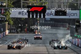 (L to R): Sergio Perez (MEX) Red Bull Racing RB16B and Lewis Hamilton (GBR) Mercedes AMG F1 W12 at the restart of the race. 06.06.2021. Formula 1 World Championship, Rd 6, Azerbaijan Grand Prix, Baku Street Circuit, Azerbaijan, Race Day.