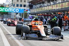 Lando Norris (GBR) McLaren MCL35M in the pits while the race is stopped. 06.06.2021. Formula 1 World Championship, Rd 6, Azerbaijan Grand Prix, Baku Street Circuit, Azerbaijan, Race Day.