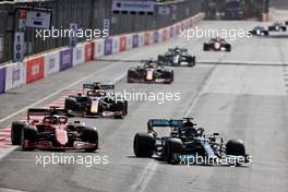 (L to R): Charles Leclerc (MON) Ferrari SF-21 and Lewis Hamilton (GBR) Mercedes AMG F1 W12 battle for position. 06.06.2021. Formula 1 World Championship, Rd 6, Azerbaijan Grand Prix, Baku Street Circuit, Azerbaijan, Race Day.
