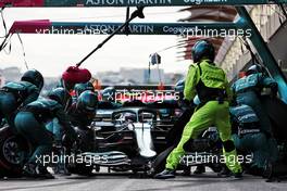 Sebastian Vettel (GER) Aston Martin F1 Team AMR21 makes a pit stop. 06.06.2021. Formula 1 World Championship, Rd 6, Azerbaijan Grand Prix, Baku Street Circuit, Azerbaijan, Race Day.