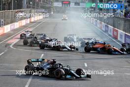 Lewis Hamilton (GBR) Mercedes AMG F1 W12 locks up under braking and runs wide at the restart of the race while attempting to pass Sergio Perez (MEX) Red Bull Racing RB16B. 06.06.2021. Formula 1 World Championship, Rd 6, Azerbaijan Grand Prix, Baku Street Circuit, Azerbaijan, Race Day.