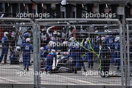 Mick Schumacher (GER) Haas VF-21 pushed back in the pits. 06.06.2021. Formula 1 World Championship, Rd 6, Azerbaijan Grand Prix, Baku Street Circuit, Azerbaijan, Race Day.