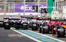 Nikita Mazepin (RUS) Haas F1 Team VF-21 joins a queue of cars leaving the pits. 05.06.2021. Formula 1 World Championship, Rd 6, Azerbaijan Grand Prix, Baku Street Circuit, Azerbaijan, Qualifying Day.