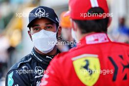 (L to R): Lewis Hamilton (GBR) Mercedes AMG F1 with Charles Leclerc (MON) Ferrari in qualifying parc ferme. 05.06.2021. Formula 1 World Championship, Rd 6, Azerbaijan Grand Prix, Baku Street Circuit, Azerbaijan, Qualifying Day.