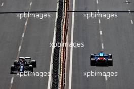 Pierre Gasly (FRA) AlphaTauri AT02 and Fernando Alonso (ESP) Alpine F1 Team A521. 05.06.2021. Formula 1 World Championship, Rd 6, Azerbaijan Grand Prix, Baku Street Circuit, Azerbaijan, Qualifying Day.