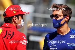 (L to R): Carlos Sainz Jr (ESP) Ferrari with George Russell (GBR) Williams Racing. 03.06.2021. Formula 1 World Championship, Rd 6, Azerbaijan Grand Prix, Baku Street Circuit, Azerbaijan, Preparation Day.