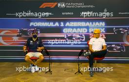 (L to R): Sergio Perez (MEX) Red Bull Racing with Lando Norris (GBR) McLaren in the FIA Press Conference. 03.06.2021. Formula 1 World Championship, Rd 6, Azerbaijan Grand Prix, Baku Street Circuit, Azerbaijan, Preparation Day.