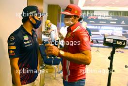 (L to R): Sergio Perez (MEX) Red Bull Racing with Carlos Sainz Jr (ESP) Ferrari. 03.06.2021. Formula 1 World Championship, Rd 6, Azerbaijan Grand Prix, Baku Street Circuit, Azerbaijan, Preparation Day.