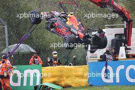 The Red Bull Racing RB16B of Sergio Perez (MEX) is craned away from the circuit after he crashed heading to the grid. 29.08.2021. Formula 1 World Championship, Rd 12, Belgian Grand Prix, Spa Francorchamps, Belgium, Race Day.