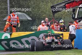 The Red Bull Racing RB16B of Sergio Perez (MEX) is craned away from the circuit after he crashed heading to the grid. 29.08.2021. Formula 1 World Championship, Rd 12, Belgian Grand Prix, Spa Francorchamps, Belgium, Race Day.