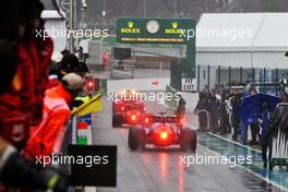 Max Verstappen (NLD) Red Bull Racing RB16B and George Russell (GBR) Williams Racing FW43B in the pits as the race is suspended. 29.08.2021. Formula 1 World Championship, Rd 12, Belgian Grand Prix, Spa Francorchamps, Belgium, Race Day.
