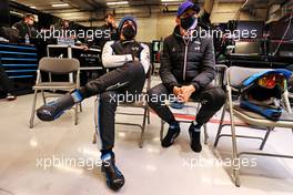 (L to R): Fernando Alonso (ESP) Alpine F1 Team and Esteban Ocon (FRA) Alpine F1 Team in the pits while the race is stopped. 29.08.2021. Formula 1 World Championship, Rd 12, Belgian Grand Prix, Spa Francorchamps, Belgium, Race Day.