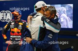 George Russell (GBR) Williams Racing celebrates his second position in qualifying parc ferme with Aleix Casanovas, Williams Racing Trainer. 28.08.2021. Formula 1 World Championship, Rd 12, Belgian Grand Prix, Spa Francorchamps, Belgium, Qualifying Day.