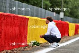 Pierre Gasly (FRA) AlphaTauri pays his respects to Anthoine Hubert. 26.08.2021. Formula 1 World Championship, Rd 12, Belgian Grand Prix, Spa Francorchamps, Belgium, Preparation Day.