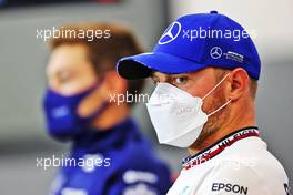 Valtteri Bottas (FIN) Mercedes AMG F1 and George Russell (GBR) Williams Racing in the FIA Press Conference. 26.08.2021. Formula 1 World Championship, Rd 12, Belgian Grand Prix, Spa Francorchamps, Belgium, Preparation Day.