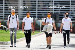 (L to R): Mark Berryman (GBR) Add Motorsports Director and Driver Manager; Lando Norris (GBR) McLaren; Jon Malvern (GBR) McLaren Performance Coach; Stoffel Vandoorne (BEL) Mercedes AMG F1 Reserve Driver. 26.03.2021. Formula 1 World Championship, Rd 1, Bahrain Grand Prix, Sakhir, Bahrain, Practice Day
