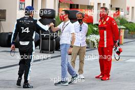 (L to R): Fernando Alonso (ESP) Alpine F1 Team; Nicolas Todt (FRA) Driver Manager; Alain Prost (FRA) Alpine F1 Team Non-Executive Director; and Gino Rosato (CDN) Ferrari. 26.03.2021. Formula 1 World Championship, Rd 1, Bahrain Grand Prix, Sakhir, Bahrain, Practice Day