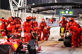 Carlos Sainz Jr (ESP) Ferrari SF-21 practices a pit stop. 26.03.2021. Formula 1 World Championship, Rd 1, Bahrain Grand Prix, Sakhir, Bahrain, Practice Day