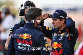 (L to R): Christian Horner (GBR) Red Bull Racing Team Principal with Sergio Perez (MEX) Red Bull Racing on the grid. 28.03.2021. Formula 1 World Championship, Rd 1, Bahrain Grand Prix, Sakhir, Bahrain, Race Day.