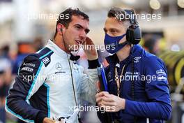 Nicholas Latifi (CDN) Williams Racing on the grid with Gaetan Jego (FRA) Williams Racing Race Engineer. 28.03.2021. Formula 1 World Championship, Rd 1, Bahrain Grand Prix, Sakhir, Bahrain, Race Day.