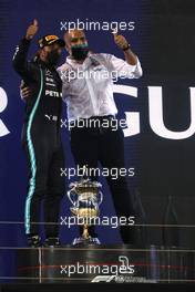 Race winner Lewis Hamilton (GBR) Mercedes AMG F1 celebrates with Russell Braithwaite (GBR) Mercedes AMG F1 Chief Financial Officer. 28.03.2021. Formula 1 World Championship, Rd 1, Bahrain Grand Prix, Sakhir, Bahrain, Race Day.
