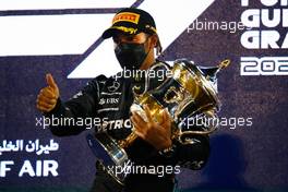 Race winner Lewis Hamilton (GBR) Mercedes AMG F1 celebrates on the podium. 28.03.2021. Formula 1 World Championship, Rd 1, Bahrain Grand Prix, Sakhir, Bahrain, Race Day.