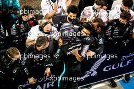 Race winner Lewis Hamilton (GBR) Mercedes AMG F1 celebrates with the team in parc ferme. 28.03.2021. Formula 1 World Championship, Rd 1, Bahrain Grand Prix, Sakhir, Bahrain, Race Day.