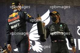 2nd place Max Verstappen (NLD) Red Bull Racing and 1st place Lewis Hamilton (GBR) Mercedes AMG F1 W12. 28.03.2021. Formula 1 World Championship, Rd 1, Bahrain Grand Prix, Sakhir, Bahrain, Race Day.