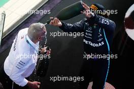 Race winner Lewis Hamilton (GBR) Mercedes AMG F1 celebrates on the podium with Russell Braithwaite (GBR) Mercedes AMG F1 Chief Financial Officer. 28.03.2021. Formula 1 World Championship, Rd 1, Bahrain Grand Prix, Sakhir, Bahrain, Race Day.