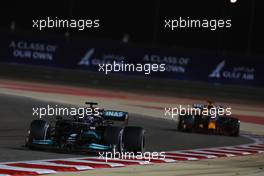 Lewis Hamilton (GBR) Mercedes AMG F1 W12 leads Max Verstappen (NLD) Red Bull Racing RB16B. 28.03.2021. Formula 1 World Championship, Rd 1, Bahrain Grand Prix, Sakhir, Bahrain, Race Day.