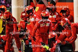 Ferrari makes a pit stop. 28.03.2021. Formula 1 World Championship, Rd 1, Bahrain Grand Prix, Sakhir, Bahrain, Race Day.