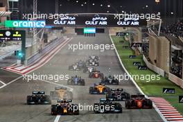 Max Verstappen (NLD) Red Bull Racing RB16B leads Lewis Hamilton (GBR) Mercedes AMG F1 W12 and Charles Leclerc (MON) Ferrari SF-21 at the start of the race. 28.03.2021. Formula 1 World Championship, Rd 1, Bahrain Grand Prix, Sakhir, Bahrain, Race Day.
