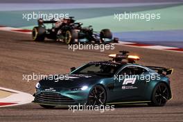 Lewis Hamilton (GBR) Mercedes AMG F1 W12 behind the Aston Martin FIA Safety Car. 28.03.2021. Formula 1 World Championship, Rd 1, Bahrain Grand Prix, Sakhir, Bahrain, Race Day.