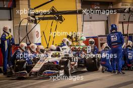 Mick Schumacher (GER) Haas VF-21 makes a pit stop. 28.03.2021. Formula 1 World Championship, Rd 1, Bahrain Grand Prix, Sakhir, Bahrain, Race Day.