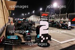 Lewis Hamilton (GBR) Mercedes AMG F1 W12 and Valtteri Bottas (FIN) Mercedes AMG F1 W12 in qualifying parc ferme. 27.03.2021. Formula 1 World Championship, Rd 1, Bahrain Grand Prix, Sakhir, Bahrain, Qualifying Day.