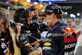 Max Verstappen (NLD) Red Bull Racing celebrates his pole position in qualifying parc ferme with the team. 27.03.2021. Formula 1 World Championship, Rd 1, Bahrain Grand Prix, Sakhir, Bahrain, Qualifying Day.
