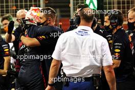 Max Verstappen (NLD) Red Bull Racing celebrates his pole position in qualifying parc ferme with the team. 27.03.2021. Formula 1 World Championship, Rd 1, Bahrain Grand Prix, Sakhir, Bahrain, Qualifying Day.