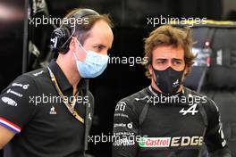 Fernando Alonso (ESP) Alpine F1 Team with Karel Loos (BEL) Alpine F1 Team Race Engineer. 27.03.2021. Formula 1 World Championship, Rd 1, Bahrain Grand Prix, Sakhir, Bahrain, Qualifying Day.