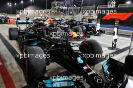 Lewis Hamilton (GBR) Mercedes AMG F1 W12; Max Verstappen (NLD) Red Bull Racing RB16B; and Valtteri Bottas (FIN) Mercedes AMG F1 W12 in qualifying parc ferme. 27.03.2021. Formula 1 World Championship, Rd 1, Bahrain Grand Prix, Sakhir, Bahrain, Qualifying Day.